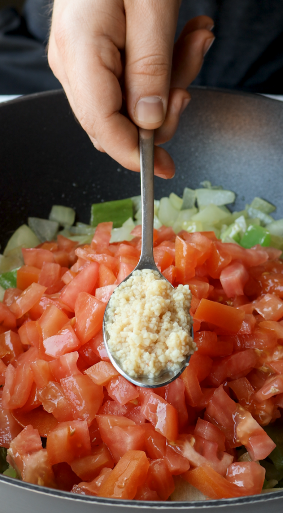 diced onions and green peppers, tomatoes, garlic